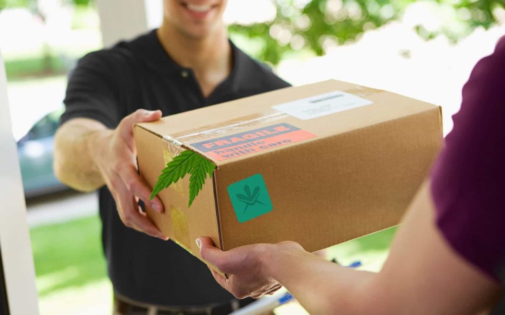 Mail order marijuana being handed to customer